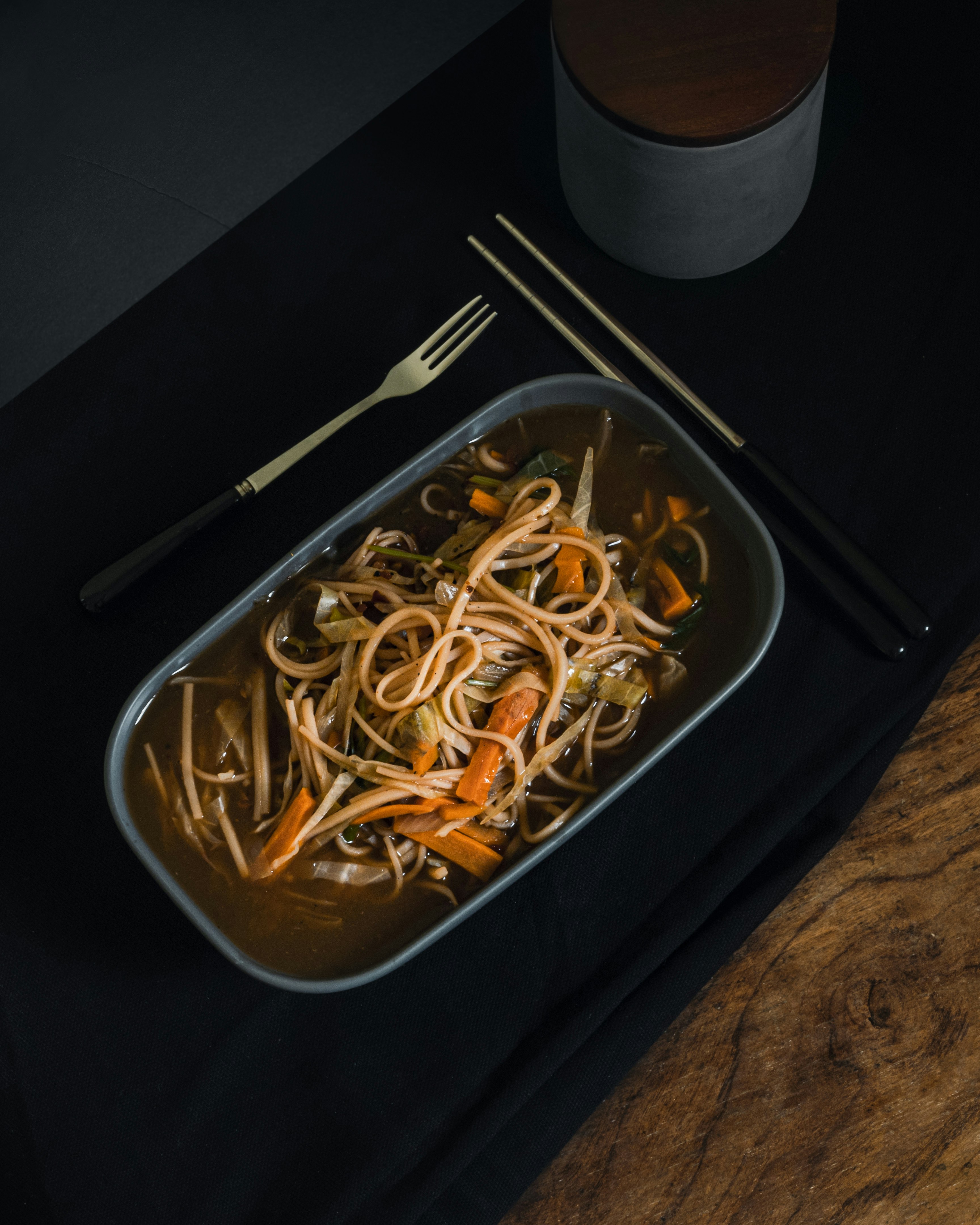 white pasta on black tray